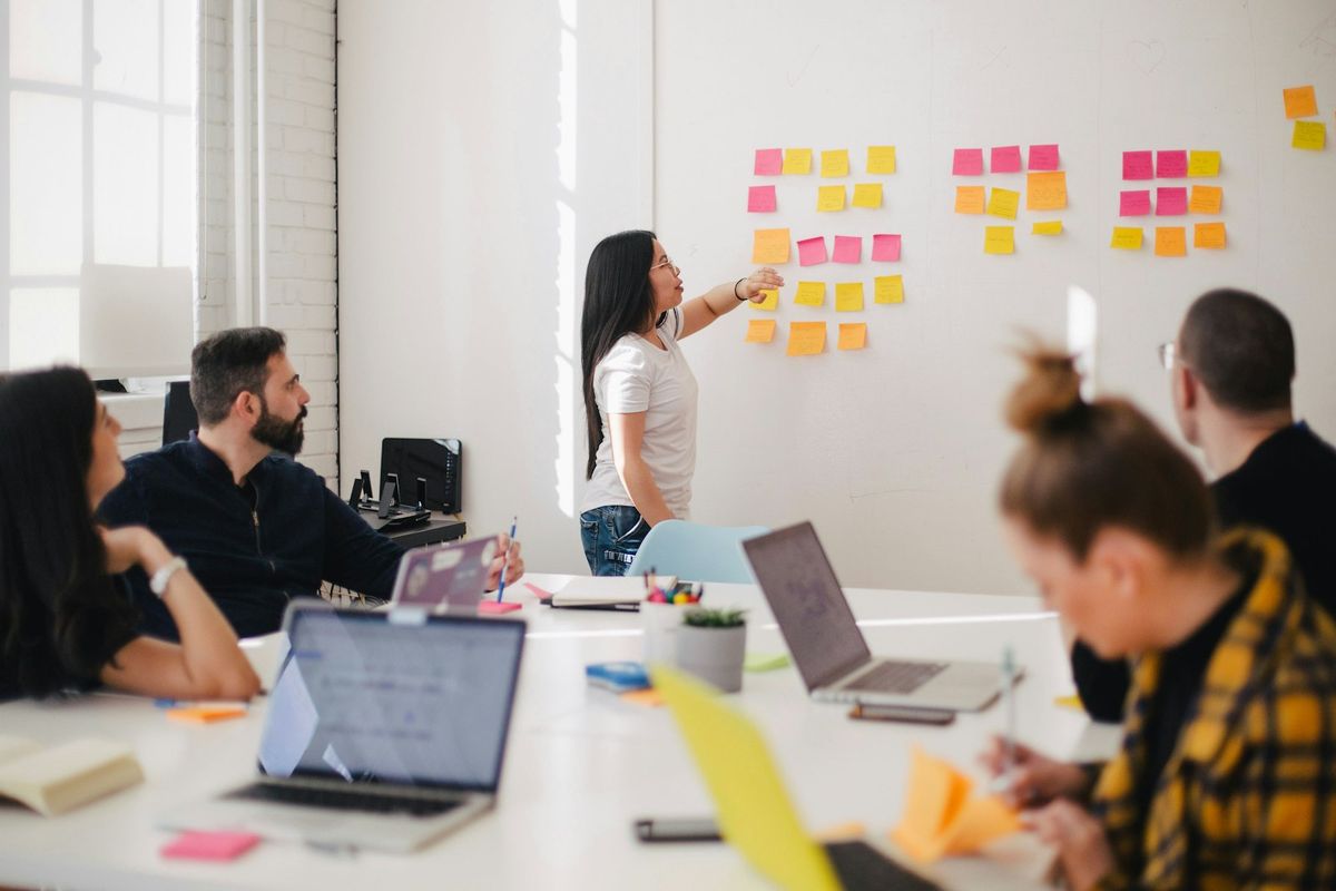 A strategy session mapping the operating model on the wall